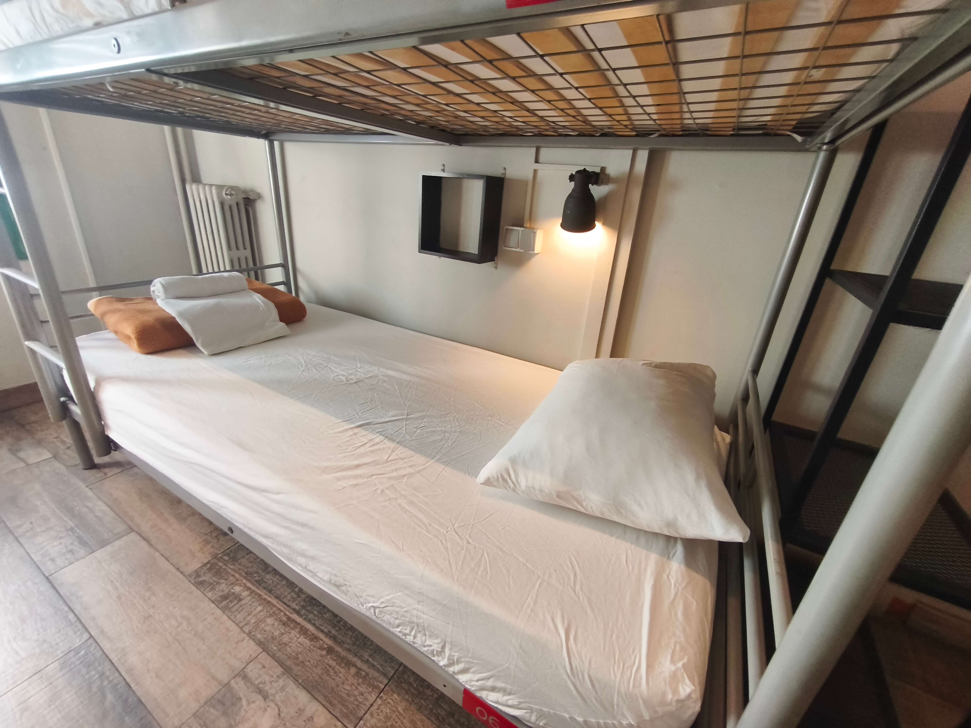 Female-only dormitory with premium mattresses and bed linen