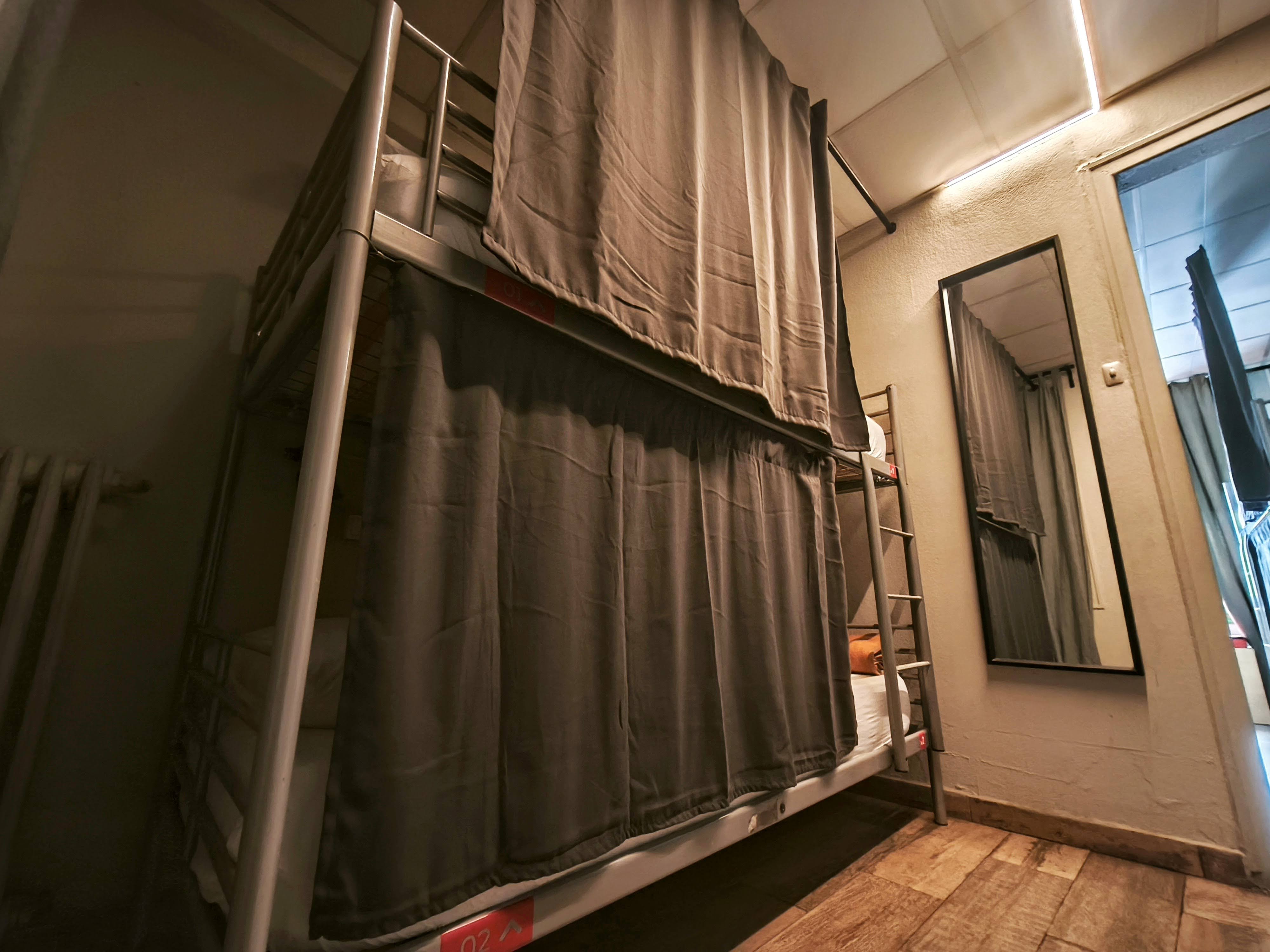 Buba House modern female dormitory with comfortable bunk beds and reading lights